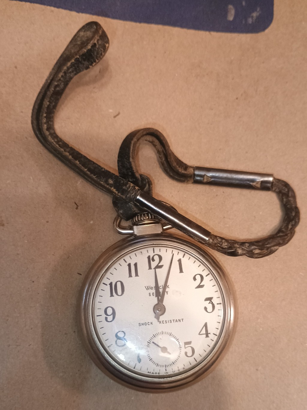 Silver Pocket Watch With Brown Fob